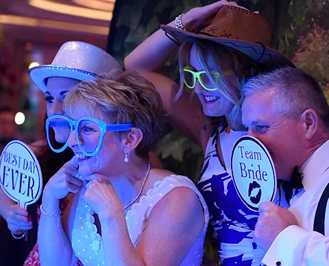 Guests in glasses at a wedding